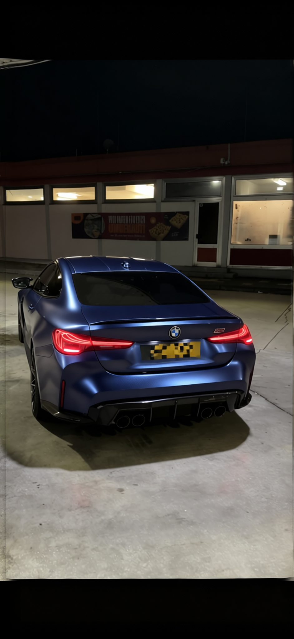 Car rendered in Frozen Satin Metallic Charcoal Blue gloss wrap