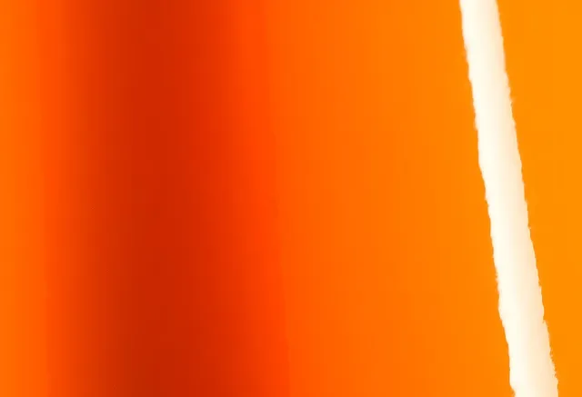 Avery Dennison Gloss Orange vinyl wrap film texture — Specced